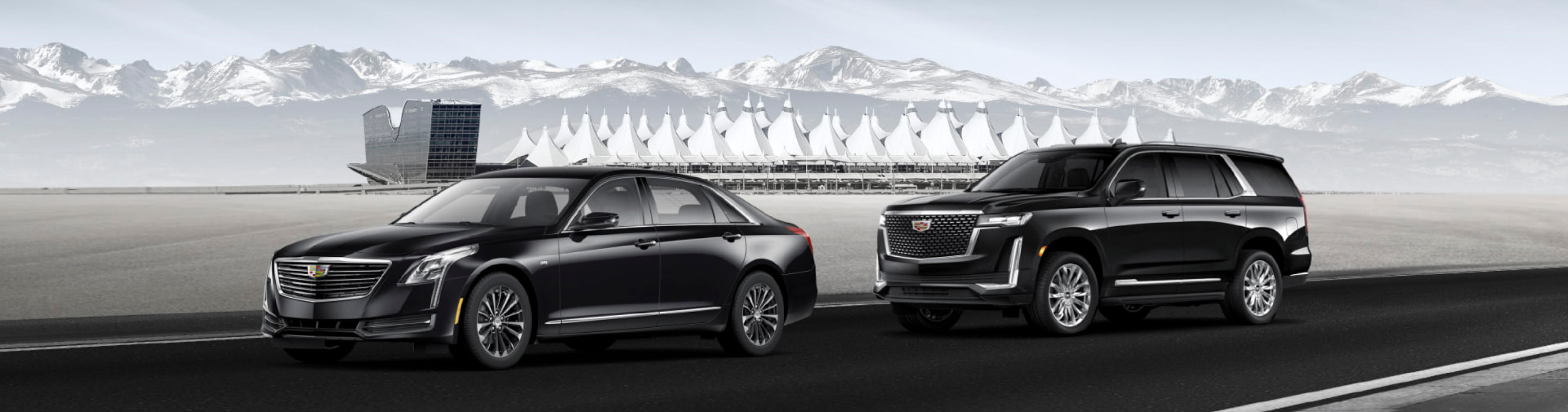 Denver First Class Limo sedan and SUV at Denver International Airport with the Rocky Mountains